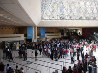 People waiting to get into the Louvre